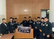 PSHT Rayon Candimulyo Ranting Dolopo Pusat Madiun Menyerahkan Hasil Donasi Ke DKP Madiun