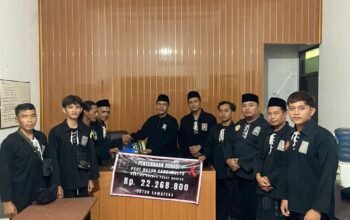 PSHT Rayon Candimulyo Ranting Dolopo Pusat Madiun Menyerahkan Hasil Donasi Ke DKP Madiun