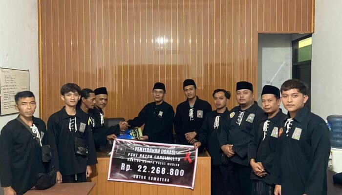 PSHT Rayon Candimulyo Ranting Dolopo Pusat Madiun Menyerahkan Hasil Donasi Ke DKP Madiun