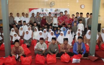 Polres Nganjuk dan PSMTI Berbagi Kasih, 65 Anak Yatim Al Ikhlas Terima Santunan Sambut Hari Bhayangkara ke-80