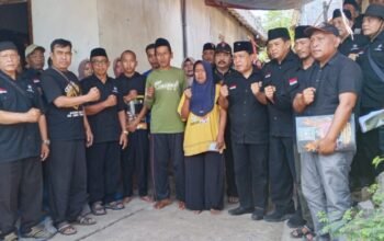 PSHT Peduli Nganjuk Salurkan Bantuan Bedah Rumah dan Santunan untuk Korban Pengeroyokan Sukorejo Loceret